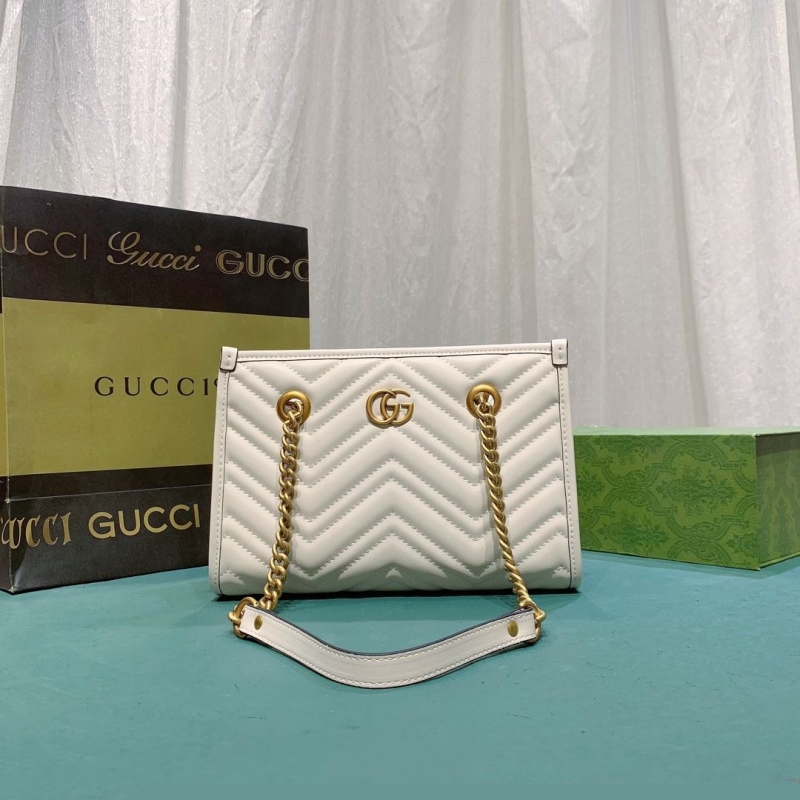 G*u*i top handle bags